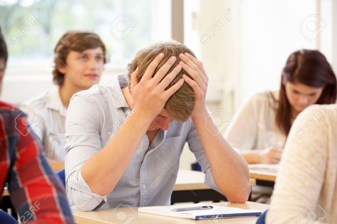 33603902-student-struggling-in-class.jpg